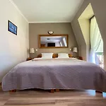 Aparthotel Mikołajki *