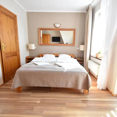 Aparthotel Mikołajki 3*