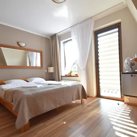 Aparthotel Mikołajki 3*