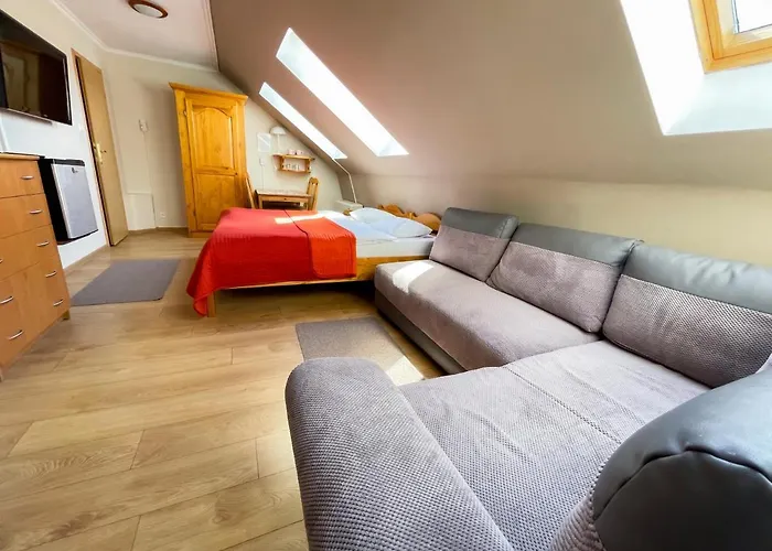 Pokoje Centrum * Mikołajki